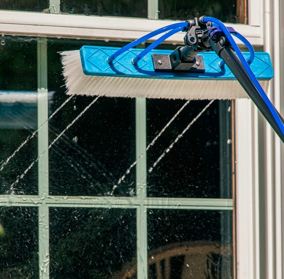 Window cleaning with a water-fed pole brush on a home window